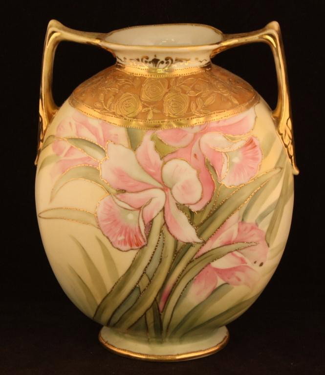 NIPPON Double Handled Floral Pillow Vase: 7 1/2" tall. Pinks and greens with gold outlines. Mark #47. Good condition, tight spider crack on bottom.