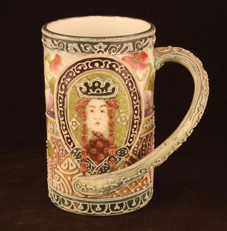 NIPPON Moriage Art Nouveau Style Portrait Mug: 5.25" tall. This unbelievable piece features a wrap around handle and rare art nouveau style. Unmarked. Excellent condition. Seven beads missing around top rim.