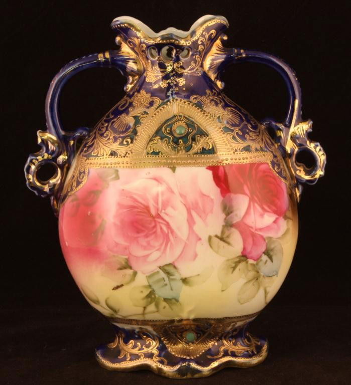 NIPPON Cobalt Double Handled Vase: 8.5" tall "Jeweled Roses" design with lots of gold & jeweling on the piece. Mark 52. Excellent condition with minor gold loss.