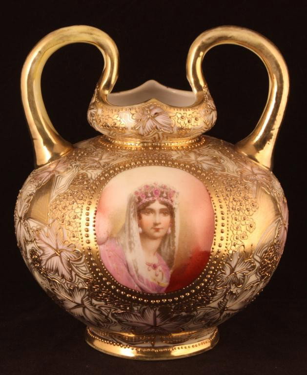 NIPPON Portrait Vase of Josephine de Beauharnais: 6 3/4" tall to top of handle. Josephine de Beauharnais was the wife of Napoleon Bonaparte. Beautiful gold scroll decor and rose on back of vase. Unmarked. Excellent condition with gold loss to handles