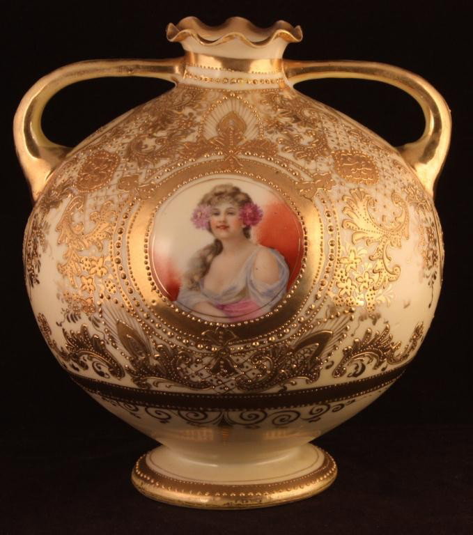NIPPON Bulbous Double Handled Vase: 7 1/2" tall. Portrait of beautiful woman in gold scroll pattern. Unmarked. Excellent condition with gold loss to top rim and handles.