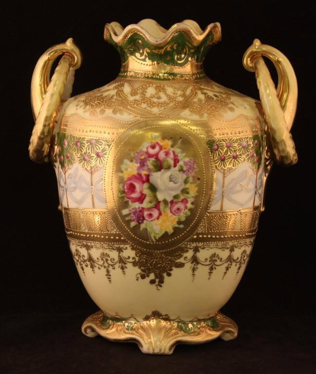 NIPPON Double Loop Vase: 9 1/2" tall. Floral Medallion with gold scroll. Excellent condition with heavy gold loss on handles and rim. Unmarked