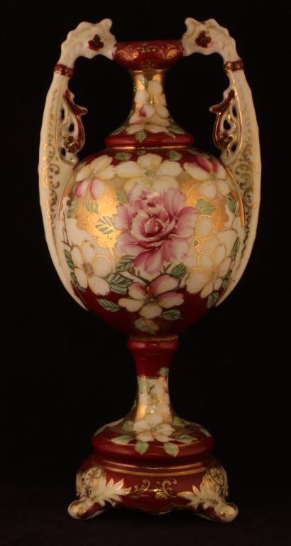 NIPPON Bolted Urn: 13" tall. Floral with gold background. Excellent condition with heavy gold loss to handles. Unmarked.