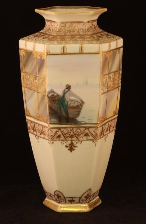 NIPPON 6 Sided Vase: 11 1/2 " Tall. Man with Boat on front medallion. Excellent condidtion with gold loss. Mark 47