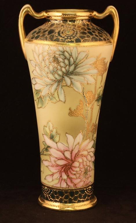 NIPPON Double Handled Vase: 10" Tall. Floral Pattern with raised gold outlining. Excellent condidtion with minor gold loss to handles. Mark 37.