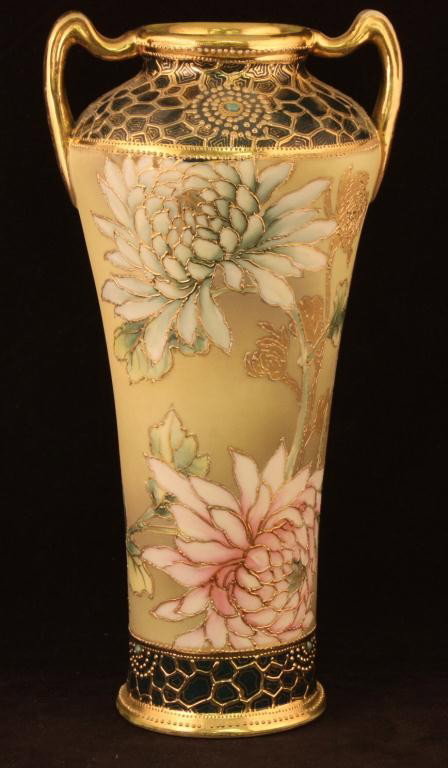 NIPPON Double Handled Vase: 10" Tall. Floral Pattern with raised gold outlining. Excellent condidtion with minor gold loss to handles. Mark 37.