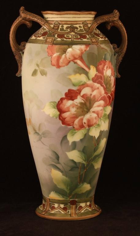 NIPPON Moriage Double Handled Vase: 11 1/2" Tall. Floral Pattern on green matted background. Spider crack in bottom. Mark 47.