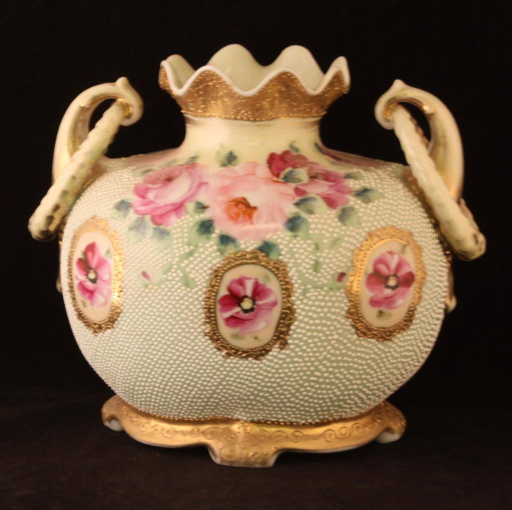 NIPPON Double Handled Loop Vase: 7 1/2" Tall. Pink and red Floral pattern with heavy white beading on body. Excellent condition with heavy gold loss. Mark 52.