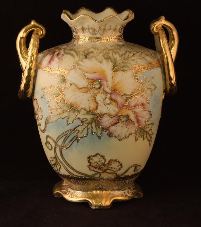 NIPPON Double Handled Loop Vase: 8 1/4" Tall. Floral Pattern with gold outlining. Excellent condition with minor gold loss to handle and top. Mark 52.