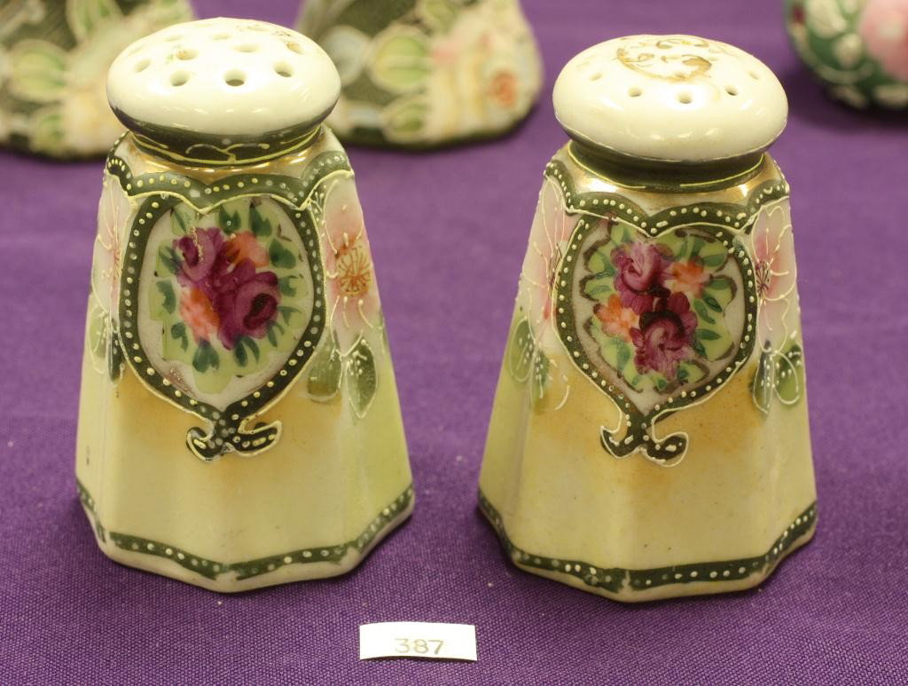 NIPPON Salt and Pepper Shakers: Red Roses and Floral Pattern. Excellent condition with gold loss to top. Marked "Nippon" in red.