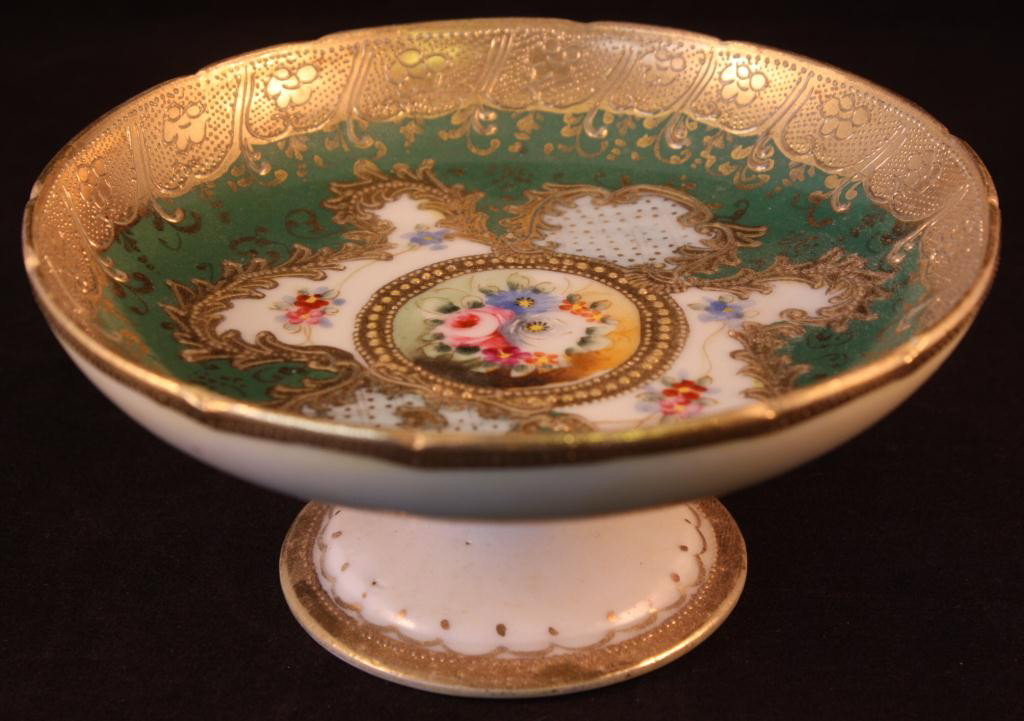NIPPON Green Floral & Gold Decorated Pedestal Bowl: 5.5" in diameter, 2.5" tall, minor gold loss, manufacturing imperfection on outside of bowl (seen in picture)