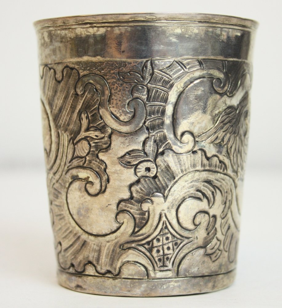 Tapering Silver Beaker: repousse and chased with eagles and rocailles, molded rim, russian, dated 1764 3"