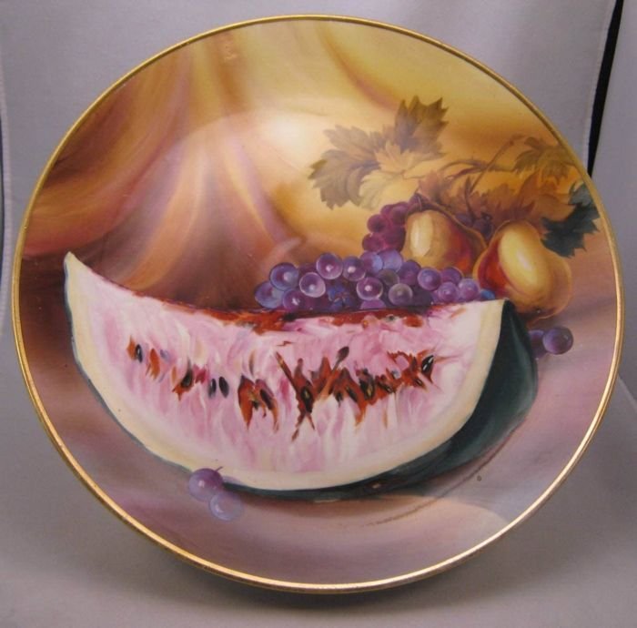Huge Antique Nippon Charger (12' across) for Hanging: With Hand Painted Watermelon, Grapes and Pears, "M in Wreath, #47. Take a look at this hard-to-find Antique Nippon Charge with factory made holes in the back for hanging. Hand painted grapes, pears an