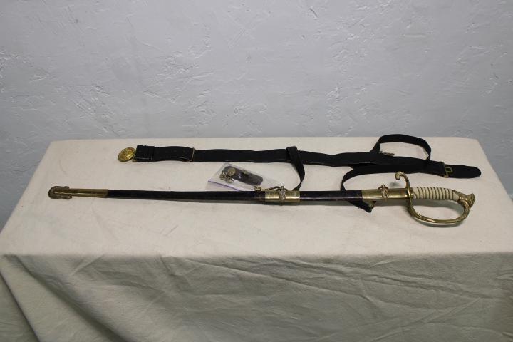 WW1 US Navy Officer Dress Sword: World War 1 United States Navy Officers Dress Sword with scabbard, belt and shoulder straps. Believed to be Original