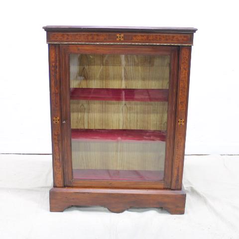 Victorian Display Cabinet: This British Cabinet is made of walnut and features inlaid trim, a locking single glass door & three interior velvet lined shelves. Key included