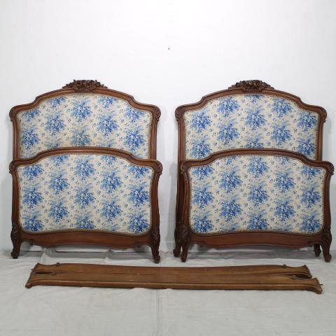 Pair of French Beds: Pair of French beds in Walnut with blue and white upholstery. Height is tallest point of the headboard, width is widest point of the headboard, depth is length of the rails.
