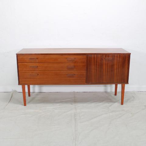 British Mid Century Sideboard by Avalon: Danish Modern Style Credenza by Avalon Furniture Co. in England. Three drawers and one dropdown cocktail mixing surface.