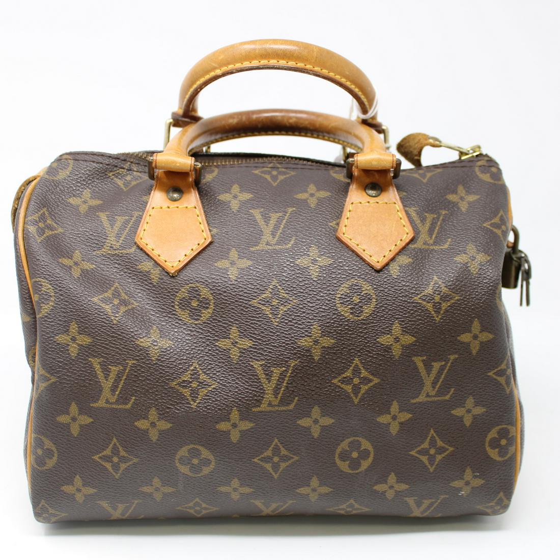 Louis Vuitton Speedy 25: Genuine Pre-Owned Louis Vuitton Speedy 25 in Brown Monogram Canvas in AB condition. Date Code is TH0914. Includes Cadena (Lock)s, Keys. Measurements: 25*19*14cm (Length * Height * Width). This lot inc