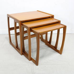 Mid Century Modern Teak Nest of Tables: This Danish Modern Style Nest is British. it stacks to make a bookcase as well. Measurement for largest table is 19in tall x 22 wide x17 deep