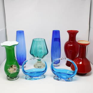 8 pieces of mid century modern glassware: Selection of Vintage Glassware sent to us from the UK. Height on largest piece is 12 inches.