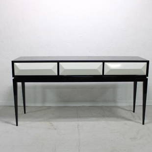 Modern black lacquered console: New Item, this console has a high gloss piano style finish to the black surfaces, the white drawers open with a push / pop out mechanism.