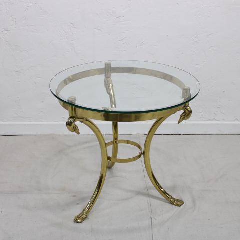 Italian Brass circular glass top table: Mid Century Modern / Hollywood Regency style brass table with round beveled glass top and duck head base, marked "made in Italy"