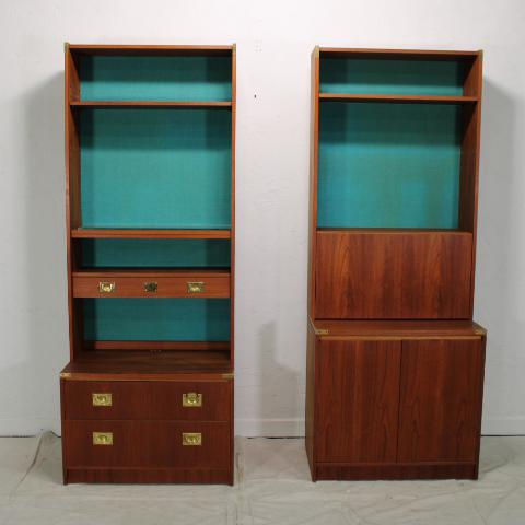 Pair of Campaign Style Bookcases: Pair of Mid Century Modern ( Danish Modern Style) bookshelves by Younger Furniture Co. with brass campaign style hardware and an aqua colored background. Has an additional glass and wood shelf. Measur