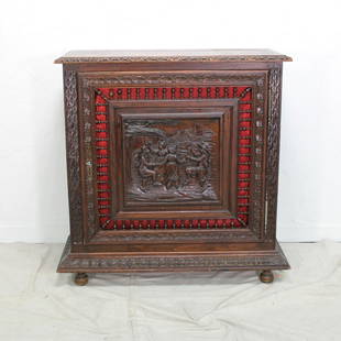 Breton Style Jam Cabinet: Breton style confiturier / jam cupboard in dark chestnut with carved sides & a single carved figural door, Key Included.