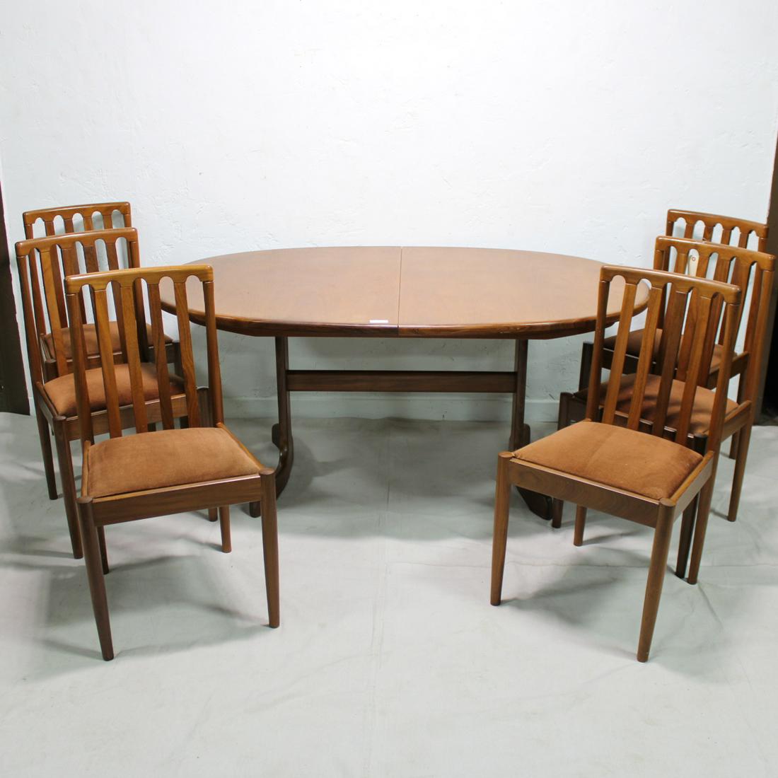 Mid Century Oval G-Plan Table & 6 Teak Chairs by: This set of 6 Danish Modern Style dining chairs are British and made by Mid Century Modern Furniture Maker Meredew- 36 in Tall x 20 wide x 19 deep. The Oval dining table with stretcher base is made by