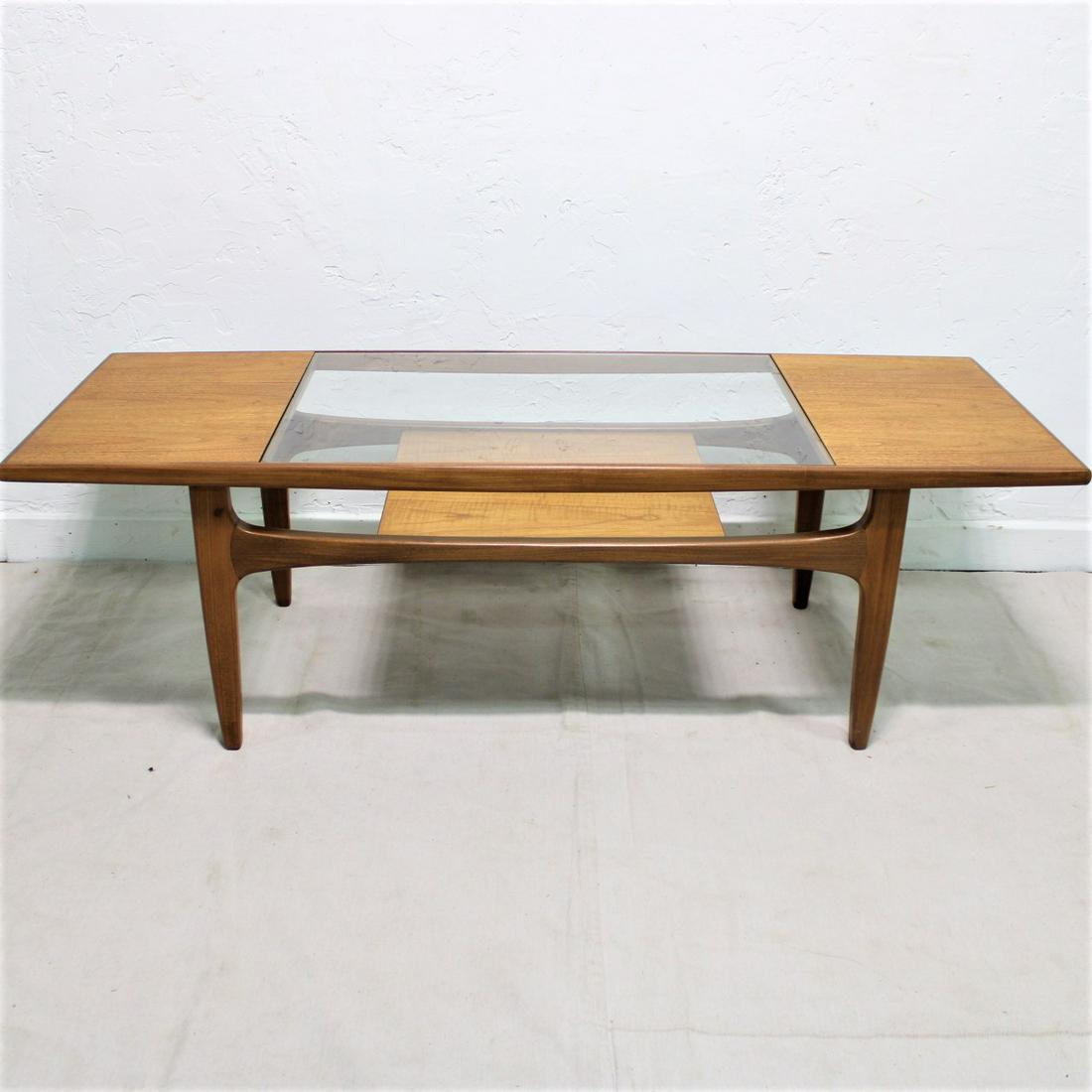 G-Plan Fresco Coffee Table as seen in Mad Men: This Danish Modern Style teak coffee table is British and made by Mid Century Modern Furniture Maker G Plan (gplan). This model table was featured in the Mid Century Modern office of Don Draper in the