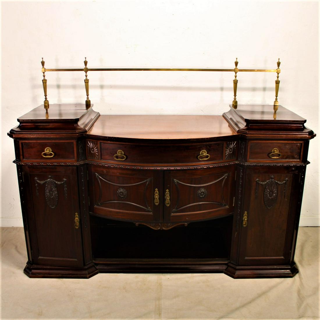 Antique Mahogany Buffet: British Antique carved Mahogany drop center twin pedestal Buffett with Brass Gallery with felt lined silverware drawer circa 1880 -0 54 tall x 72 wide x 27 deep