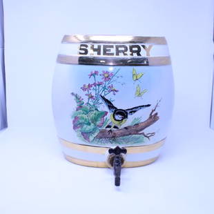 British Sherry Barrell: Early 1900's ceramic spirit jug featuring the word "Sherry" and spring motif featuring a bird, 2 butterflies and florals. Included is the pewter spicket, cork & ceramic top