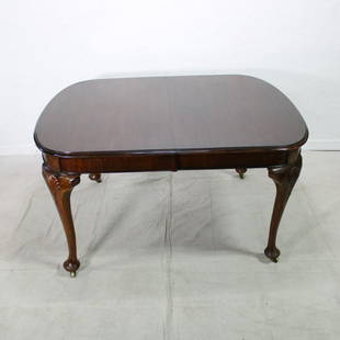 British Mahogany Table: British Mahogany Table on castors. 29 tall x 54 wide x 42