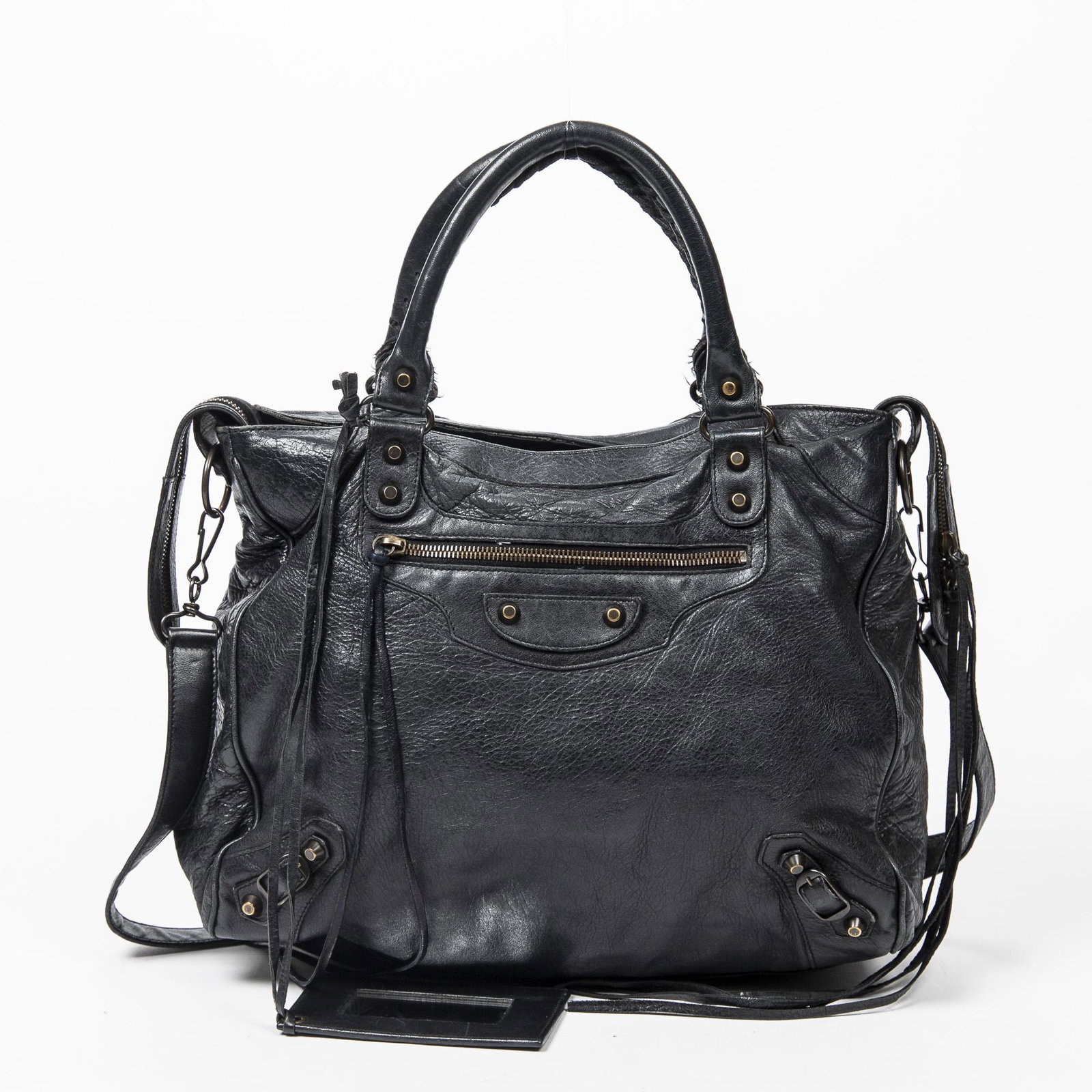 Balenciaga Classic Velo in Distressed Leather: Genuine Pre-Owned Balenciaga Classic Velo in Black Distressed Leather in AB condition. Date Code is 235216/1000/213048. Measurements: 33*27*17cm (Length * Height * Width). This lot includes a certific