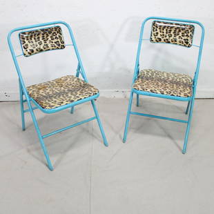 Two Turquoise Metal Folding Chairs with Cheetah Print: Two Turquoise Metal Folding Chairs with Cheetah Print 31 in tall x 18 x 19