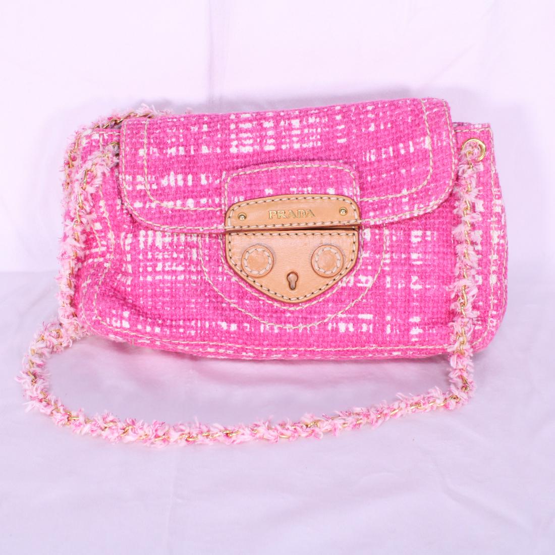 Prada Tela Flap XL in Tweed: Genuine Pre-Owned Prada Tela Flap XL in Pink Tweed in A condition. Date Code is 25. This lot includes a certificate of authenticity.