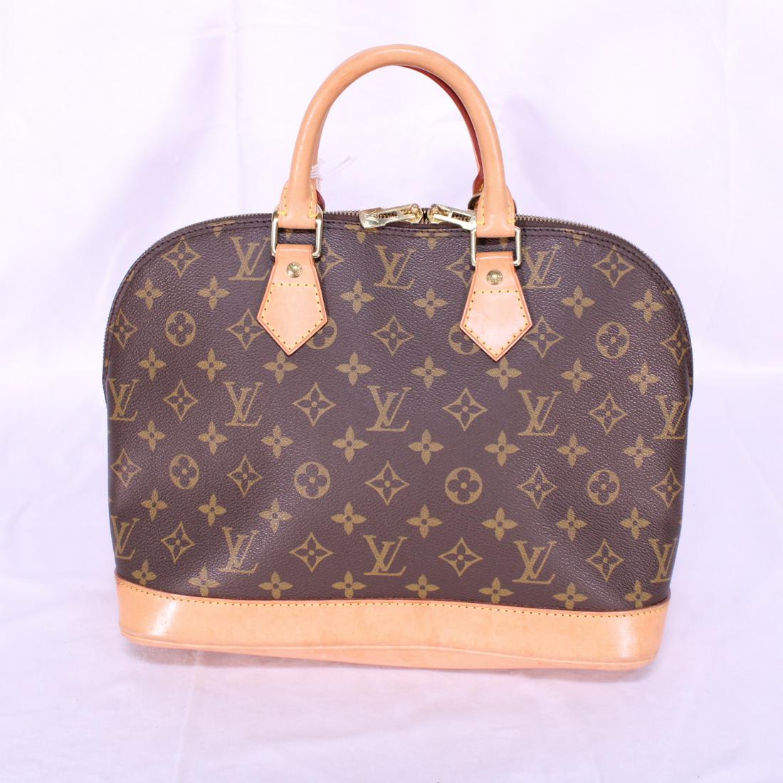 Louis Vuitton Alma PM in Monogram Canvas: Genuine Pre-Owned Louis Vuitton Alma PM in Brown Monogram Canvas in A condition. Date Code is BA1915. Measurements: 29*23*15cm (Length * Height * Width). This lot includes a certificate of authenticit