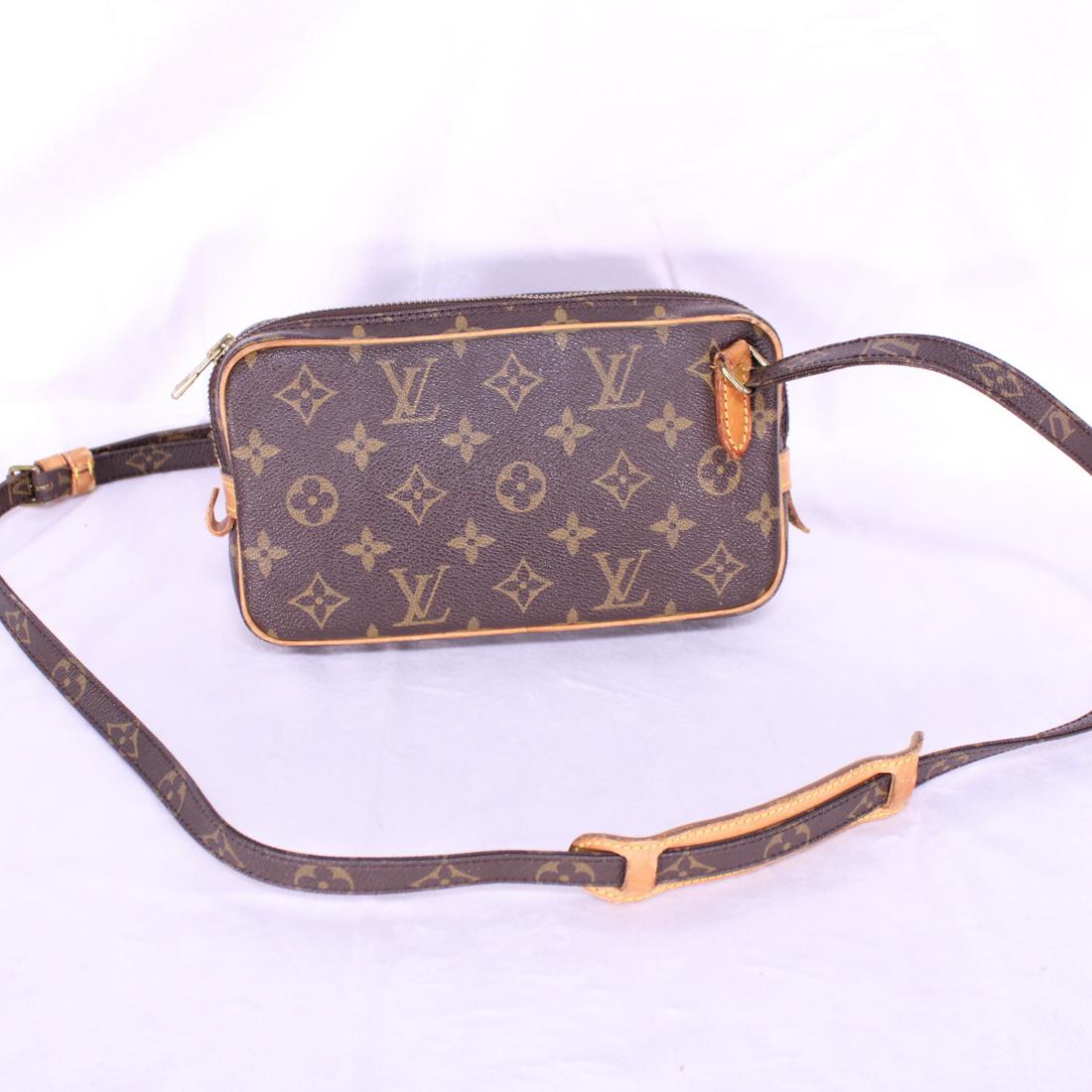 Louis Vuitton Marly Bandouliere in Monogram Canvas: Genuine Pre-Owned Louis Vuitton Marly Bandouliere in Brown Monogram Canvas in AB condition. Date Code is TH8902. Measurements: 22*12*4cm (Length * Height * Width). This lot includes a certificate of a