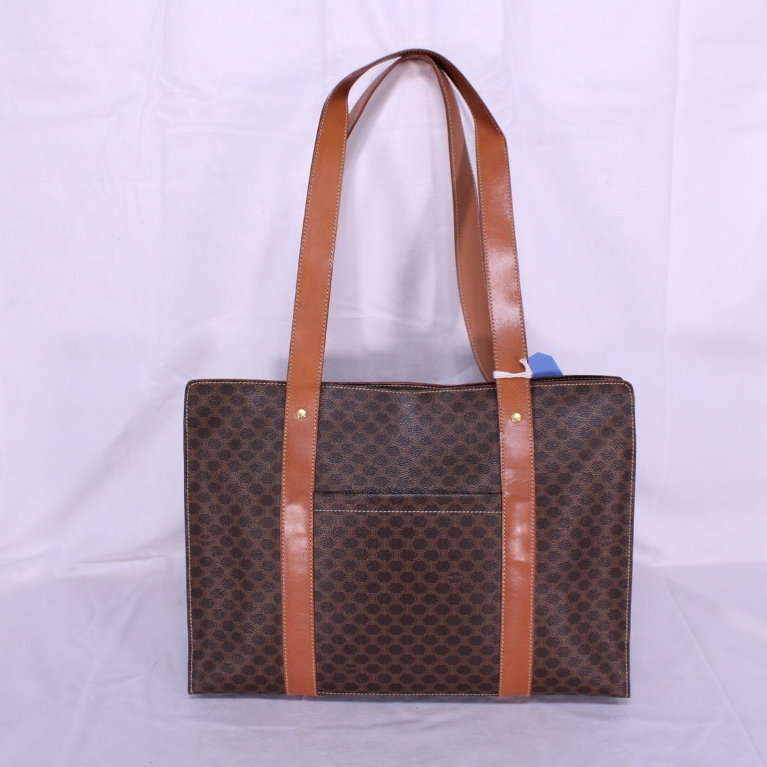 Celine Vintage Tote in Macadam Coated Canvas: Genuine Pre-Owned Celine Vintage Tote in Brown Macadam Coated Canvas in AA condition. Date Code is MC00/1. Measurements: 39*28*13cm (Length * Height * Width). This lot includes a certificate of authen