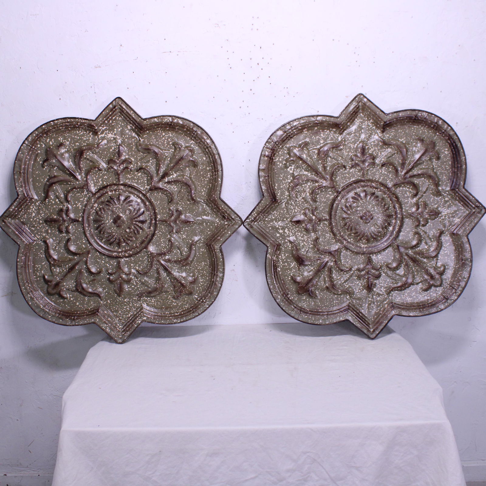 Pair of Brown Painted Metal Medallions (1 of 4)