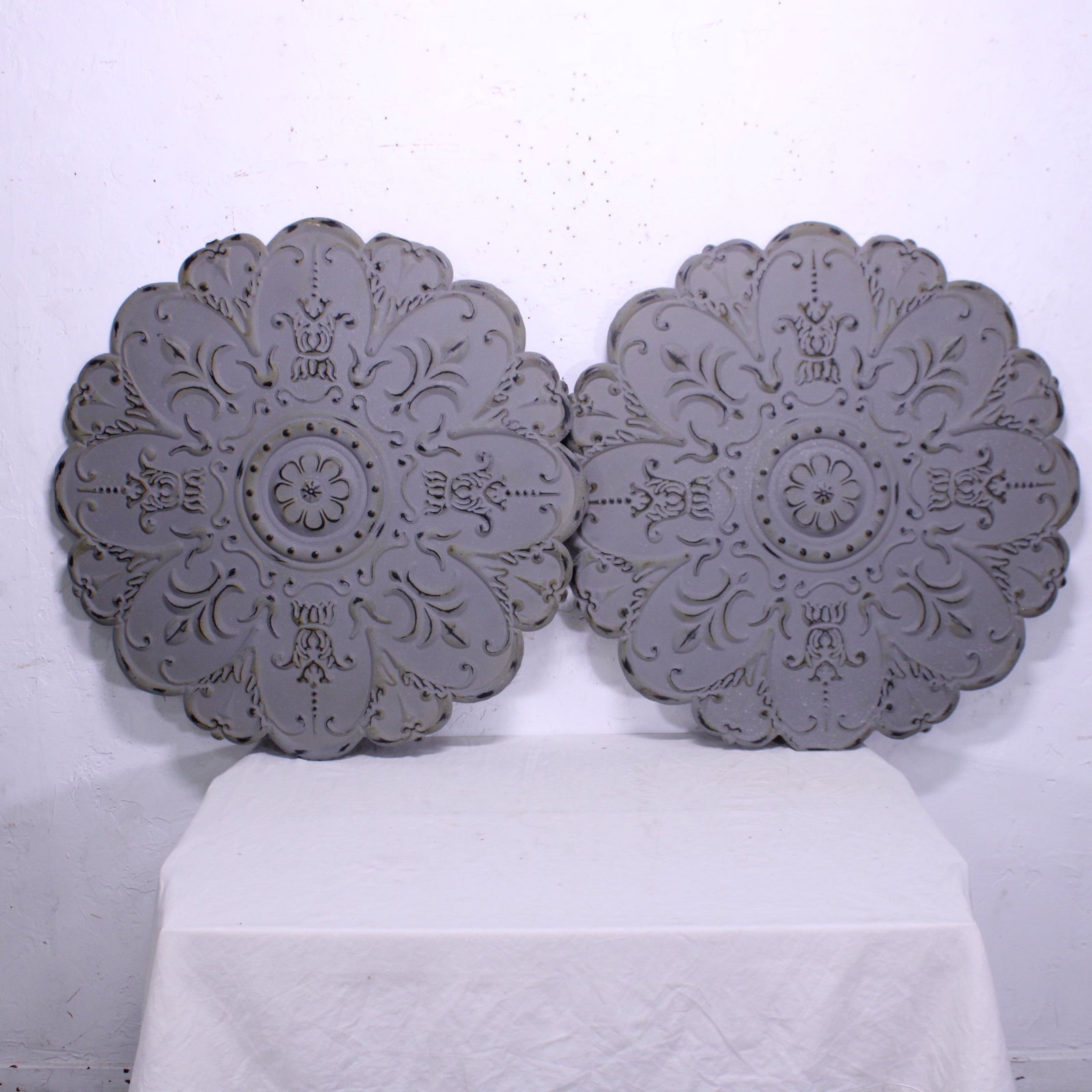 Pair of Grey Painted Metal Medallions: Pair of Grey Painted Metal Medallions - 37 x 37 in