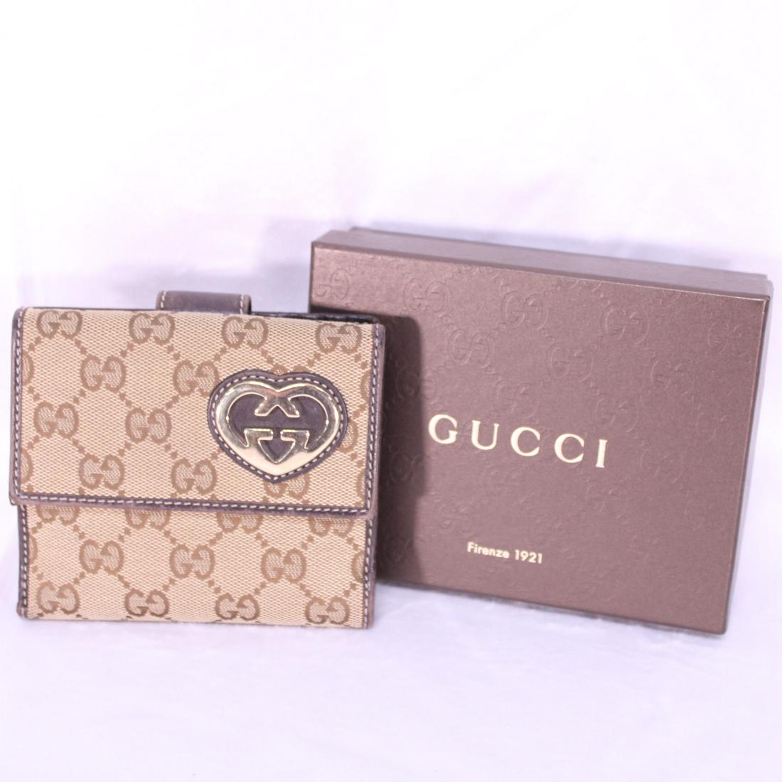 Gucci Interlocking Hearts Wallet  in Monogrammed Canvas (1 of 4)