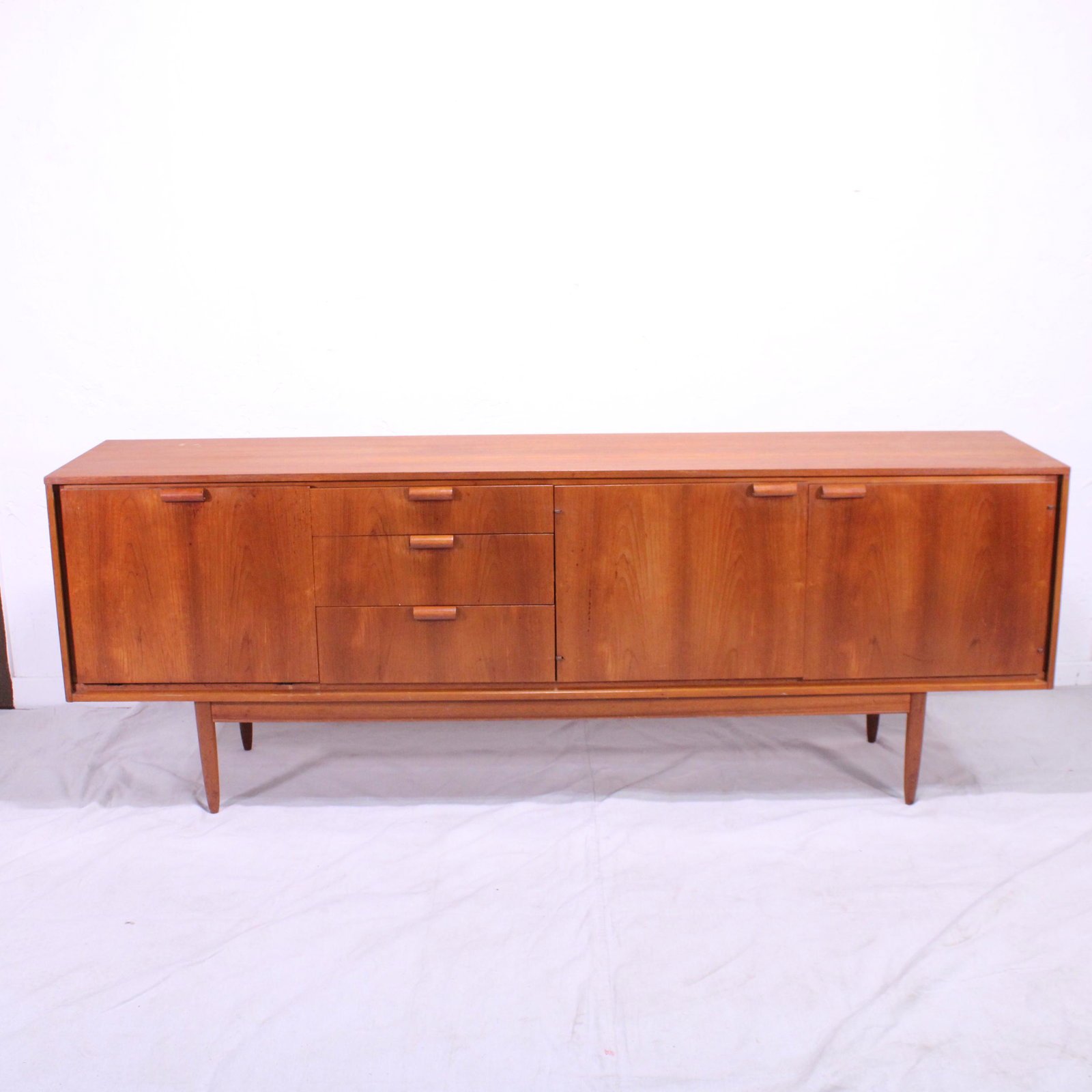 Mid Century Modern Teak Sideboard with Open Handles: This Danish Modern Style Teak Credenza is British. 31 in tall x 84 x 20