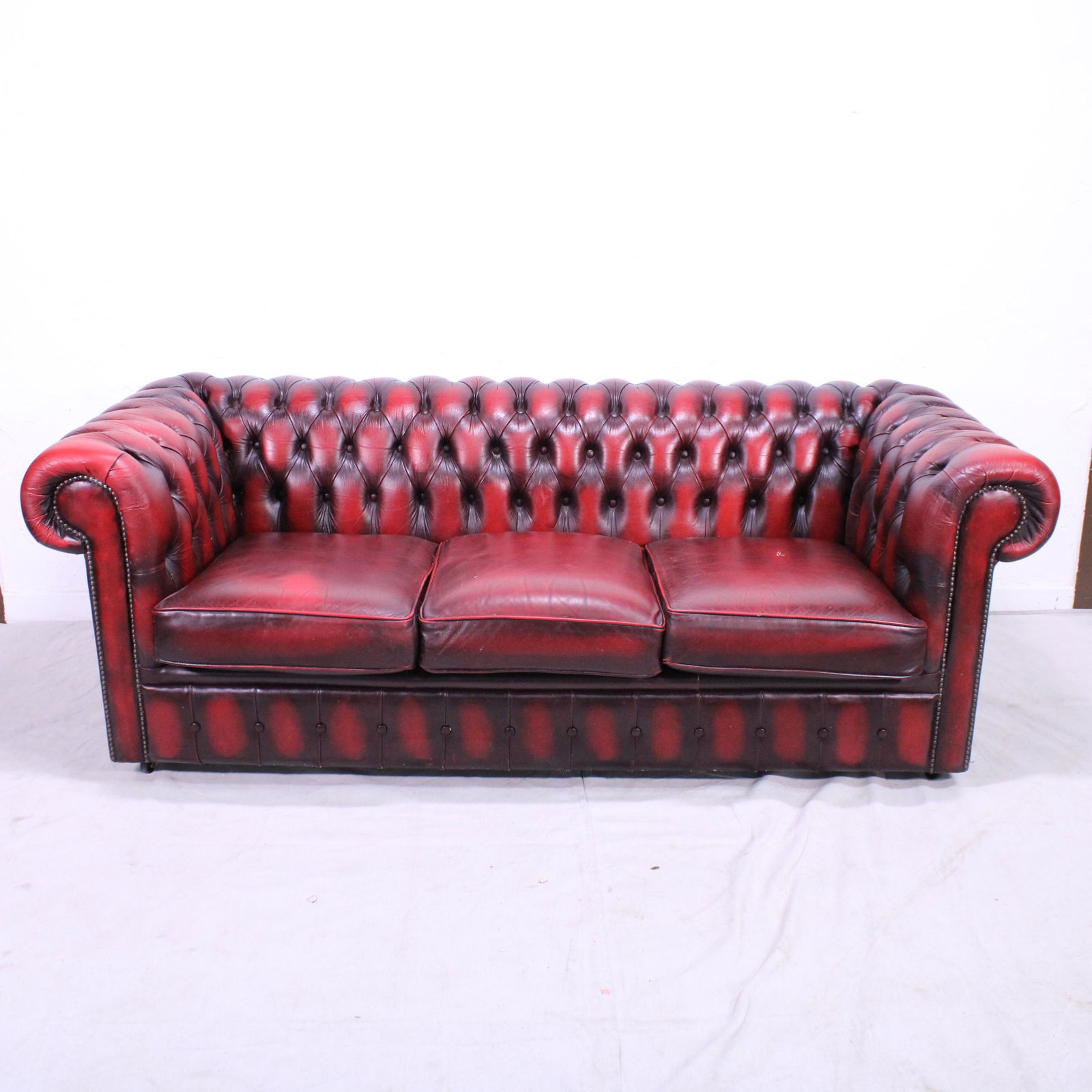 Oxblood Red Chesterfield Sofa on Castors (1 of 12)