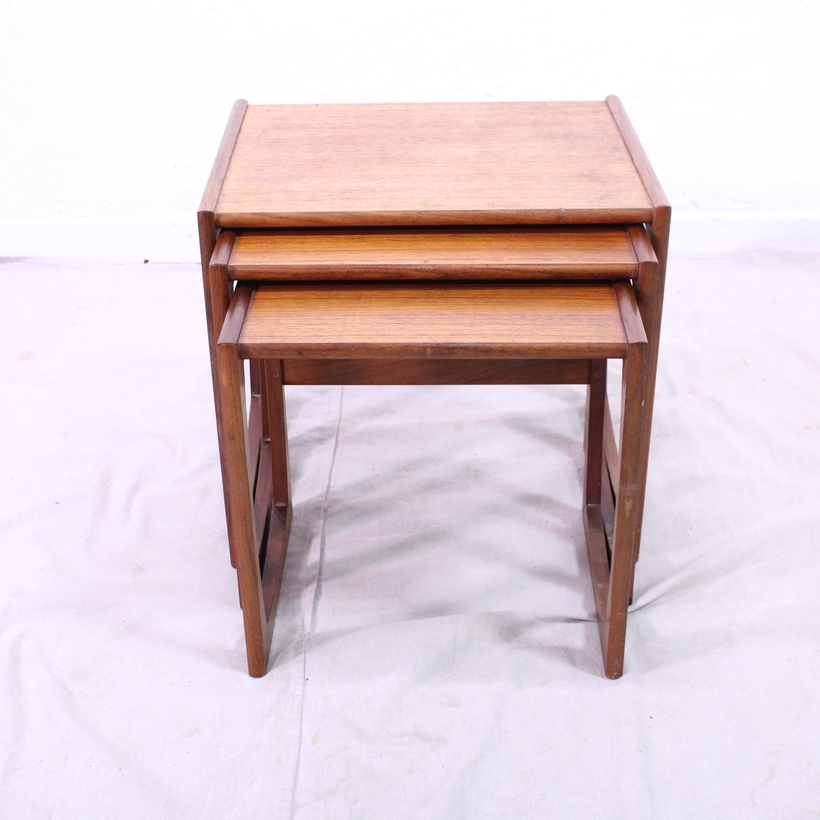 Mid Century Modern Quadrille Nest By G-plan #1: This Danish Modern Style Nest is British and made by Mid Century Modern Furniture Maker G Plan ( Gplan ) it stacks to make a bookcase as well. Measurement for largest table is 20in tall x 22 wide x 18