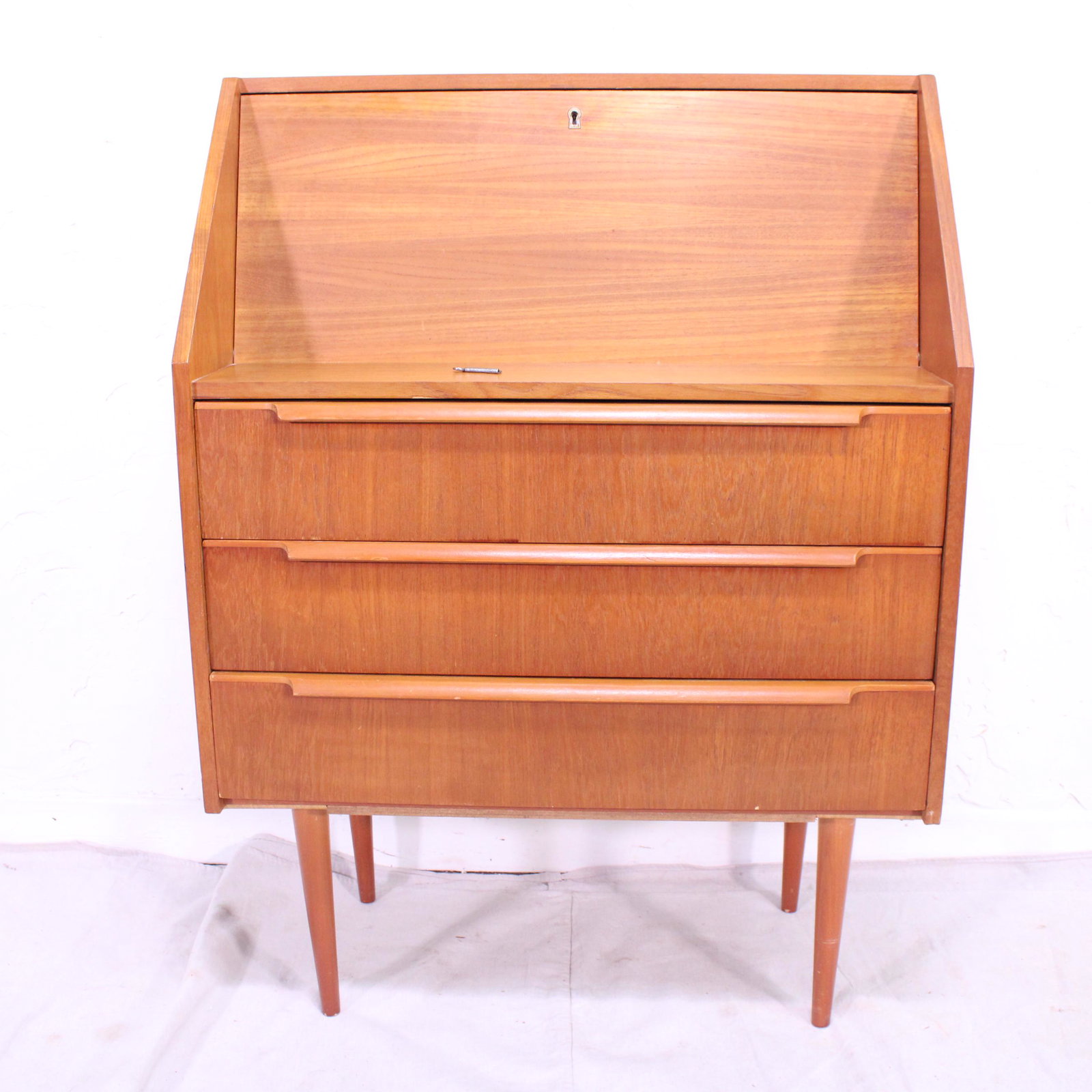 Mid Century Modern Desk on Tapered Legs: Danish Modern Style Locking Drop Front Desk, likely made in England. 40 in tall x 30 x 16 - key included