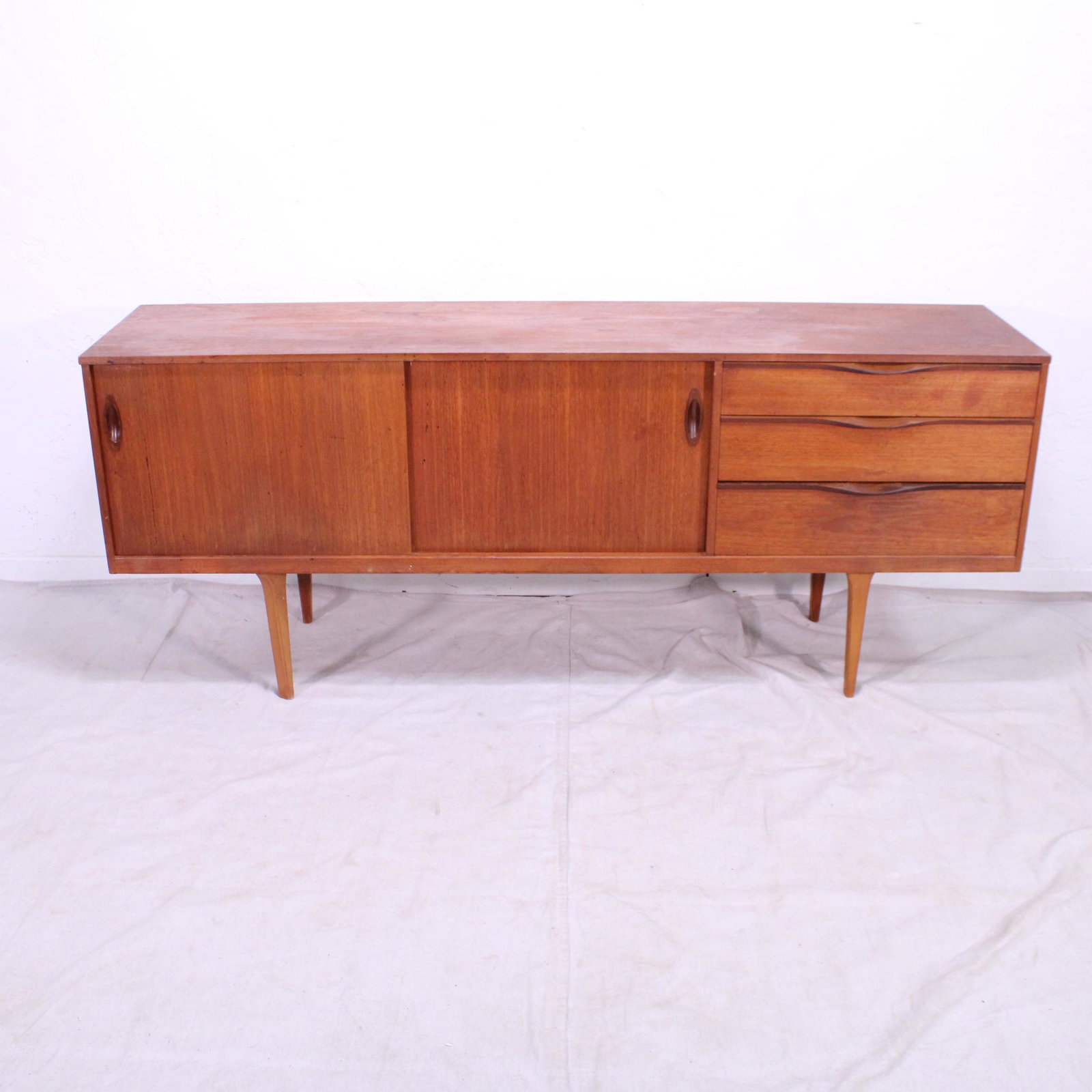 Mid Century Modern Sideboard with Sliding Doors: This Danish Modern Style Credenza is British and made by Mid Century Modern Furniture Maker Austinsuite 30 in tall x 72 x 18