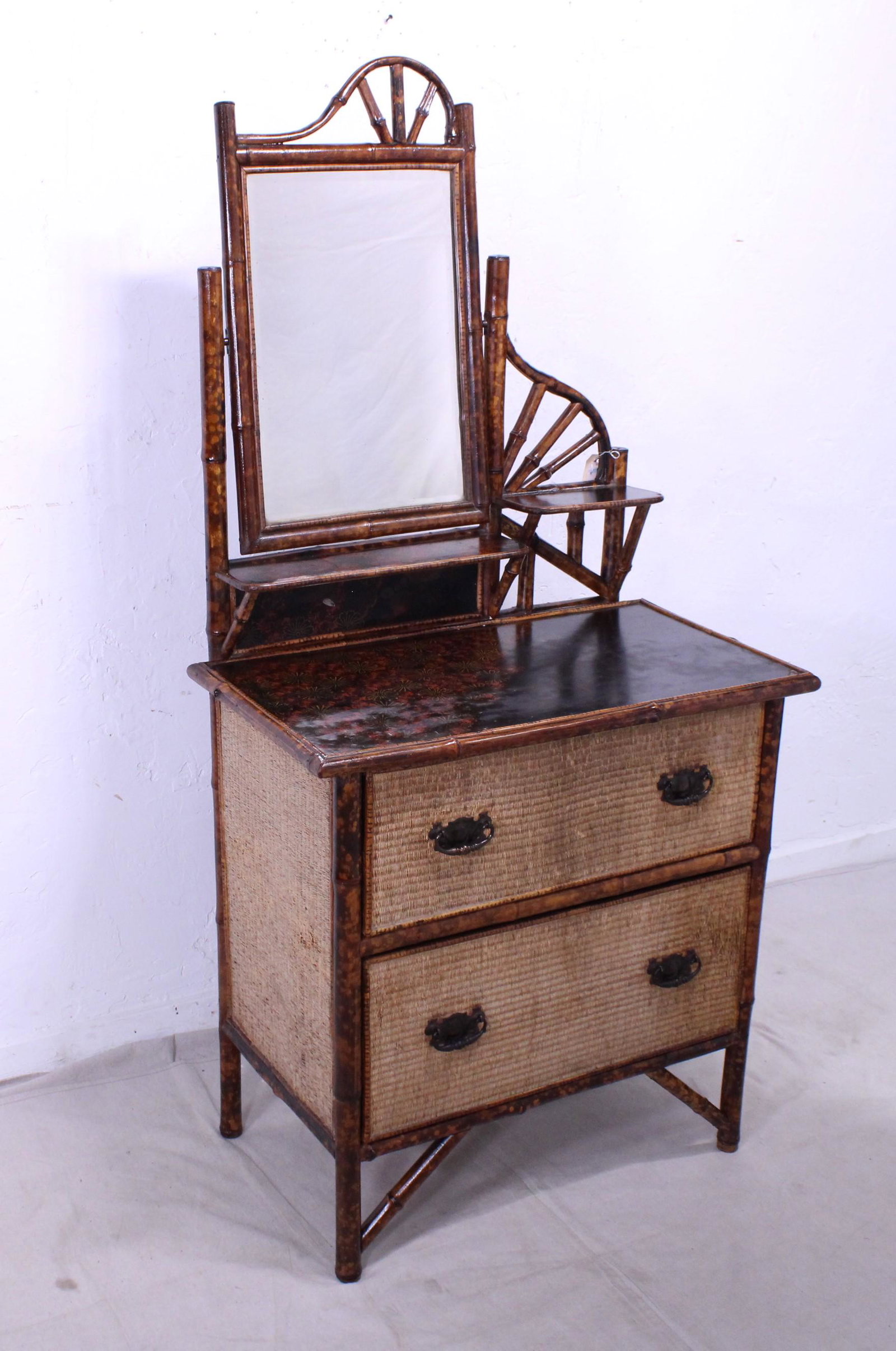 Antique Edwardian Bamboo Dressing Chest: This Bamboo came directly from Wales, It has a beveled mirror and three lacquered surfaces featuring an Asian floral motif.