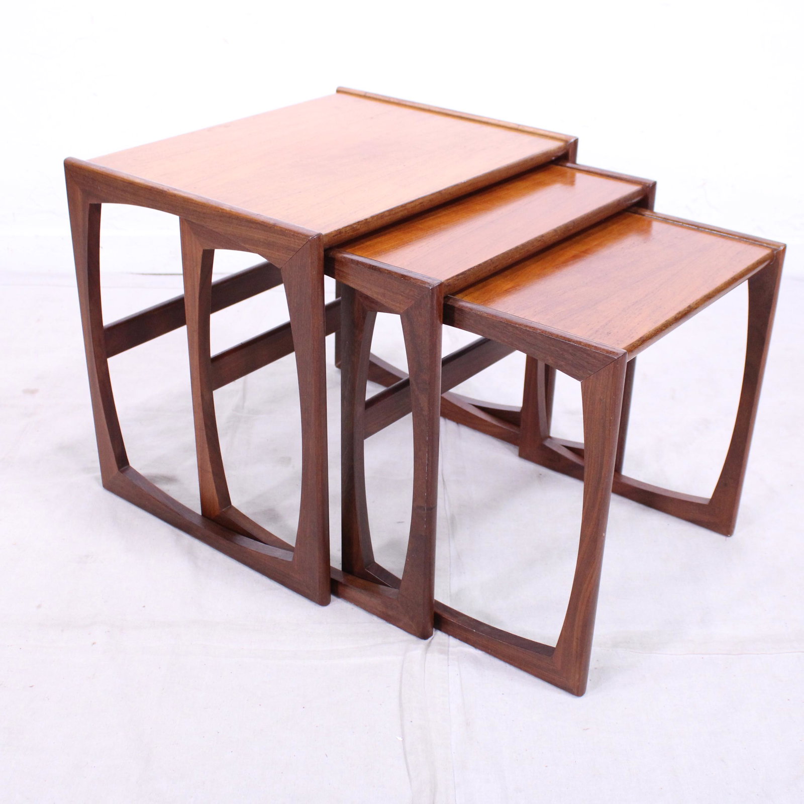Mid Century Modern Quadrille Nest By G-plan #2: This Danish Modern Style Nest is British and made by Mid Century Modern Furniture Maker G Plan ( Gplan ) it stacks to make a bookcase as well. Measurement for largest table is 20in tall x 22 wide x 18