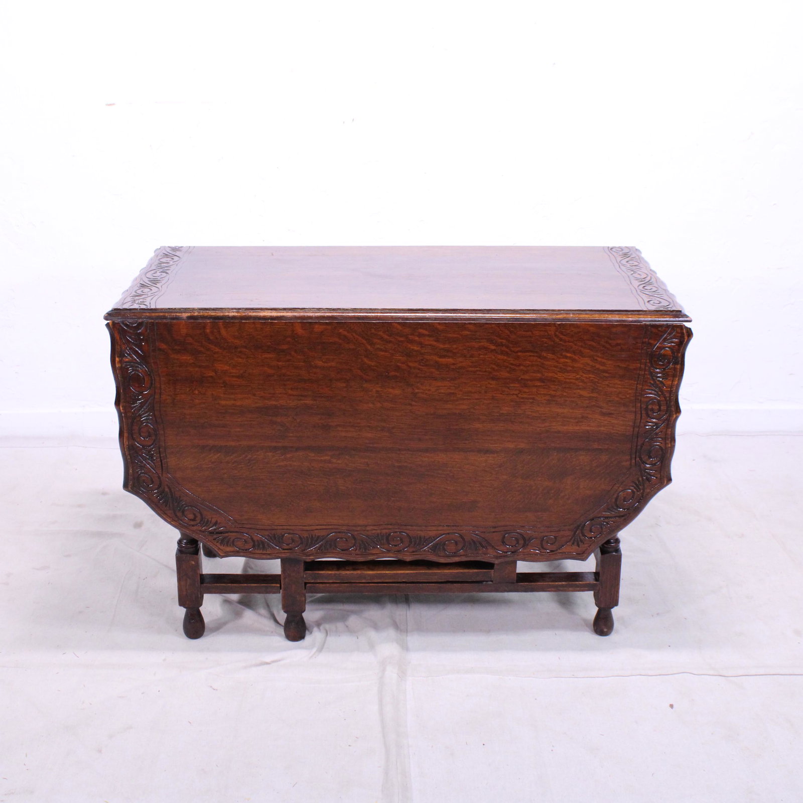 British Oak Carved Scalloped Edge Drop Leaf Table: British Oak Carved Scalloped Edge Drop Leaf Table - 29 in tall x 43 x 21 when closed ( 58 when opened )